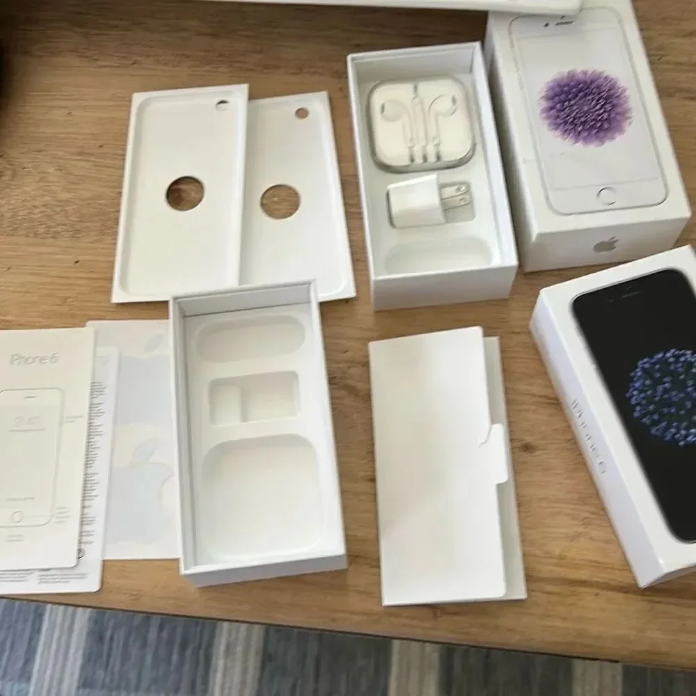 2 Apple iPhone 6 boxes with some accessories